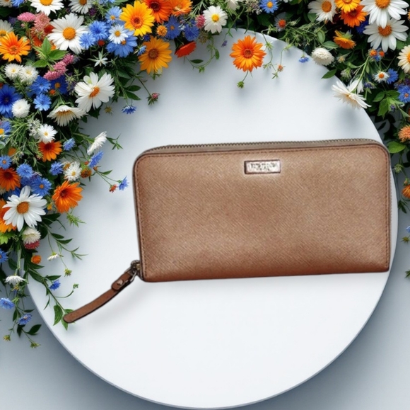 kate spade Handbags - Kate Spade Newbury Lane Leather Zip around Wallet Rose Gold